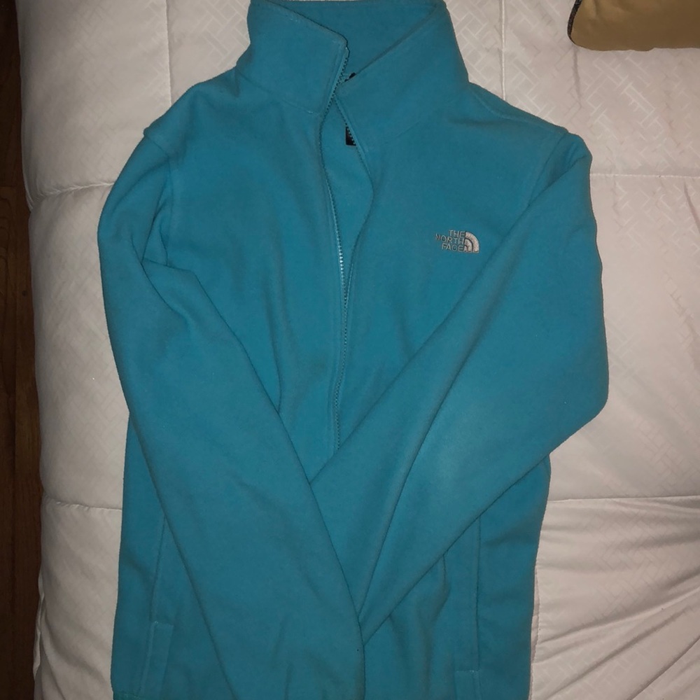 light blue light-weight fleece jacket